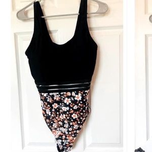Cute one piece swimsuit. NWOT in size Medium
